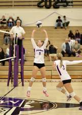 Senior Emily O’Brien, #9, sets up Janis Miola, #3, for one of her 23 assists in the game.