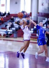 Madison Fileen drives to the basket to score two of her 23 points in the game.