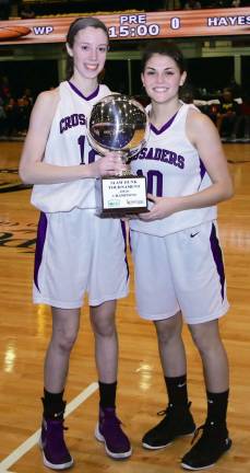 Captains Maya Bernsley, left, and Brianna DeLeo right hold The Slam Dunk Tournament Trophy.