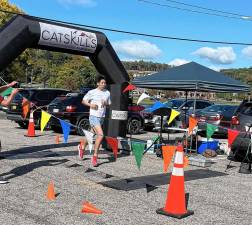 Participant Ryan Huang wins the race on Oct. 5.