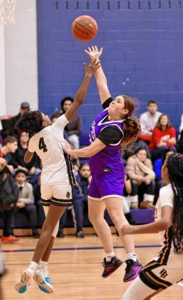 Leah Sheeran, #25, shoots over a Pine Bush defender.