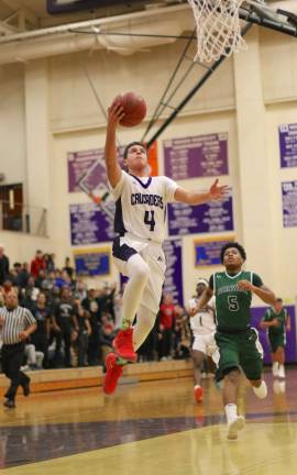 Rob Vacco (#4) led the Crusaders to victory with his 24 points
