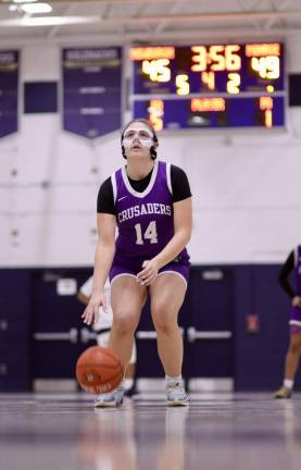 Sienna Feeley, #14, steps to the foul line late in the game.