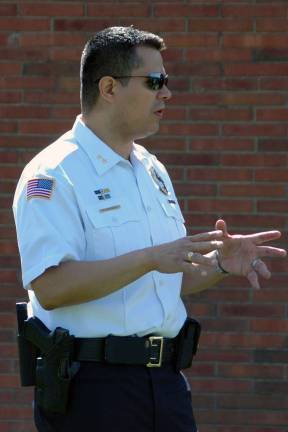 File photo by Ed Bailey Town of Woodbury Police Chief Richard Vasquez, pictured here in May 2013 following an evacuation drill at Central Valley Elementary School,