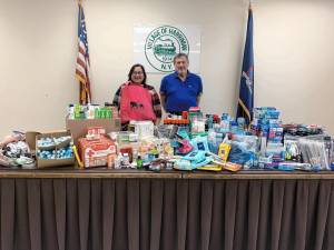 Village of Harriman Mayor G. Bruce Chichester donates all the items collected to Riley’s Parade founder Taylor Mosher, who will be putting the bags together and delivering them to the Ronald McDonald House.