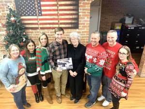 L-R: Town Councilwoman Sandra Capriglione, Councilwoman Teresa Luongo, Town Supervisor Kathryn Luciani, Town Historian Alex Prizgintas, former town historian and Woodbury Historical Society Trustee Leslie Rose, Councilman Robert Beckley, Councilman Brandon Calore, and town clerk Nicole Young.