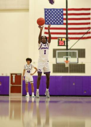 Jayden Desir, #1, hits a key free throw in the fourth quarter.