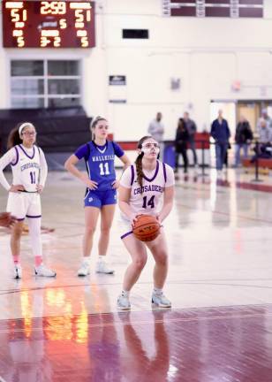 Sienna Feeley, #14, hit three free throws during overtime.