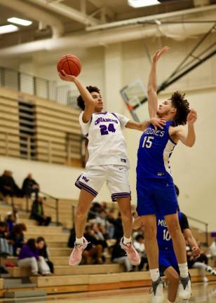 CJ Pearson, #24, scored 15 points for the Crusaders.