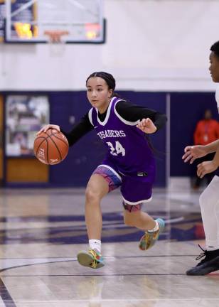 Brianna Taveras, #24, drives to the basket.