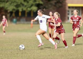 Kaylen Baricevic, #16, races past the Tiger defense.