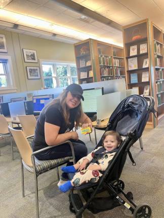 Patrons at the Monroe Free Library.