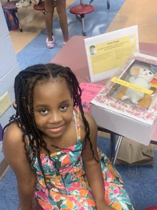 North Main third grader Ariyanah Paisley Douse with her “Honey Doggy” project.