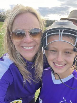 Kelly Cronin and daughter Sienna Jarer with Warwick Youth Lacrosse (Photo courtesy of Kelly Cronin)