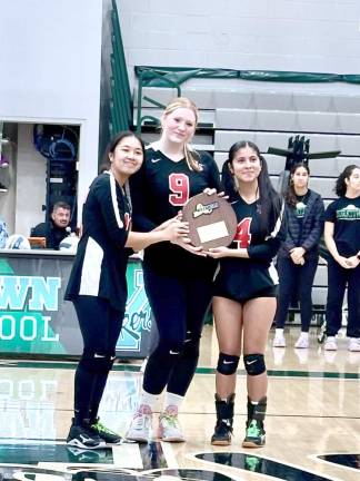 Senior captains Casey Juance, Madison Marsh, and Camila Granillo with the Regional Championship plaque.