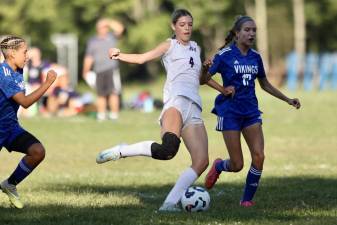 Grace Gillette, #4, scores the game-winning goal in the second half.