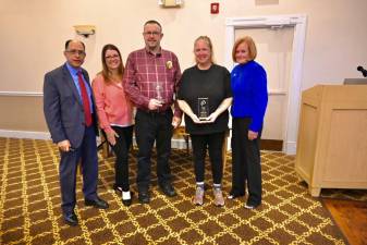 People for People Fund President Nolly Climes, secretary Tara Bliss and treasurer Maggie Smith (far right) with Positive People Award recipients Justin LaMarch and Jennifer Birch.