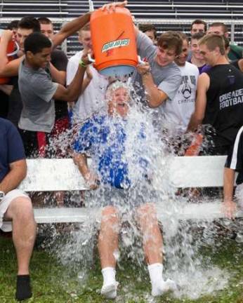 A successful season may mean this will be a common occurrence for Monroe-Woodbury football coach Bernie Connolly.