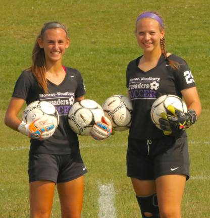 Photos by William DimmitAngela Fini, on right and Emmy Hamann, on left, combined for the shutout.