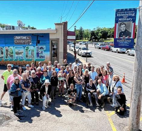 A crowd of family and friends gathered in Monroe to honor Martin Rosmarin last Friday. His military tribute banner can now be seen on Millpond Parkway.