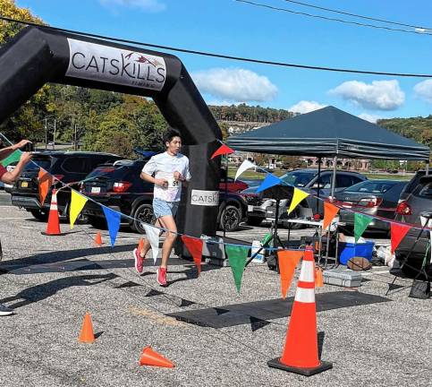 Participant Ryan Huang wins the race on Oct. 5.