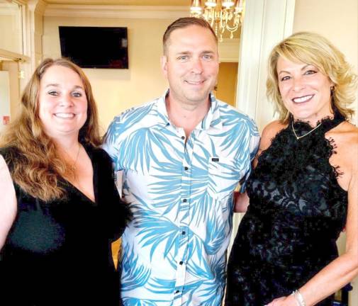 L-R: Lacey Trimble, County Executive Steve Neuhaus, and Darcie Miller.