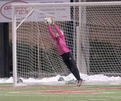 Crusader Goalie Angela Fini comes up with a big save in the second half.