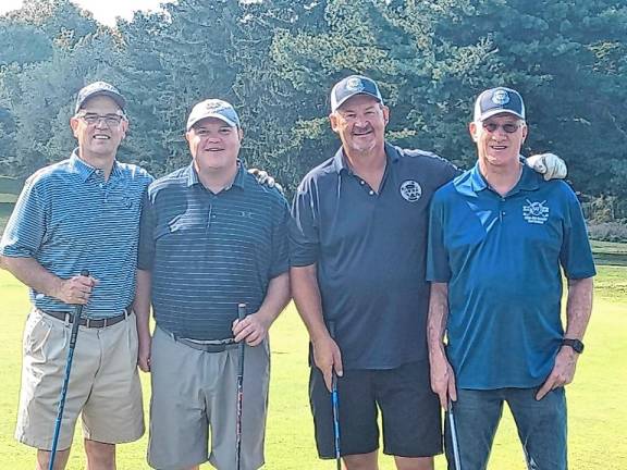 Woodbury Community Association golf outing winners Steve Murray, Brendon Baker, Chris Wendt, and Tom Hood.