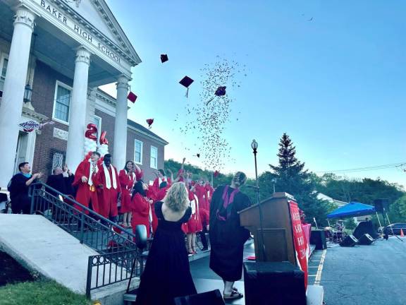 The graduates celebrate the end of their high school careers.