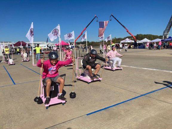 Nebrasky Plumbing, Heating &amp; Cooling holds toilet bowl race