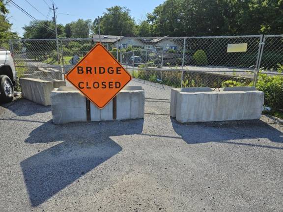 A “Bridge Closed” sign blocks drivers from traveling over the Jayne Street Bridge in the village of Florida.