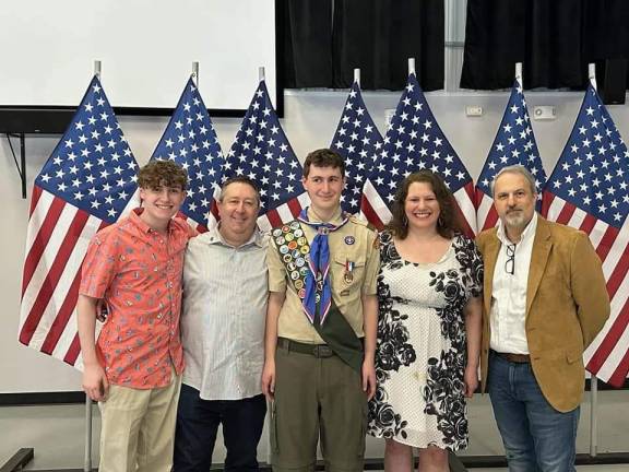 New Eagle Scout Matthew Gorlin (center) with his family and Mayor Andrew Giacomazza.