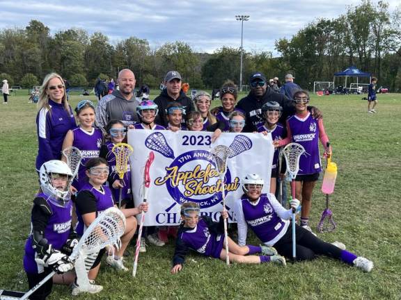 The Warwick Youth Lacrosse fifth- and sixth-grade team takes home its second consecutive championship at the annual Applefest Tournament this year. (Photo courtesy of Kelly Cronin)