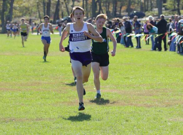 Photos by William DimmitCrusader Trevor Ladue&#x2019;s time of 15:51.37 was good enough for third place.