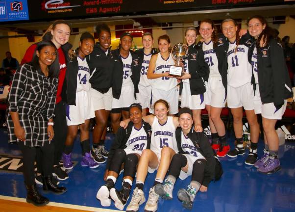 The 18th annual Slam Dunk Tournament Champion Monroe-Woodbury Crusaders: Standing from left to right: Courtney Samules, Jamie Waldron, Toni Neely, Cemiaji Powell, Savannah Paul, Gabrielle Varley, Brianna DeLeo, Maya Bernsley, Willow Duffell, Caroline Helbeck and Melissa Alifano. siting, from left to right: Taylor Neely, Sydney Harwood and Ava Delardi.