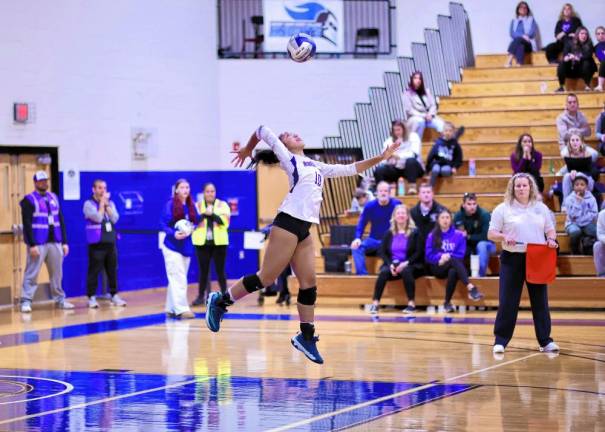 Aryanna Brown, #10, gets off a big serve during the game.