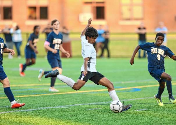 Siddharth Ranganathan launches a shot in the second half.