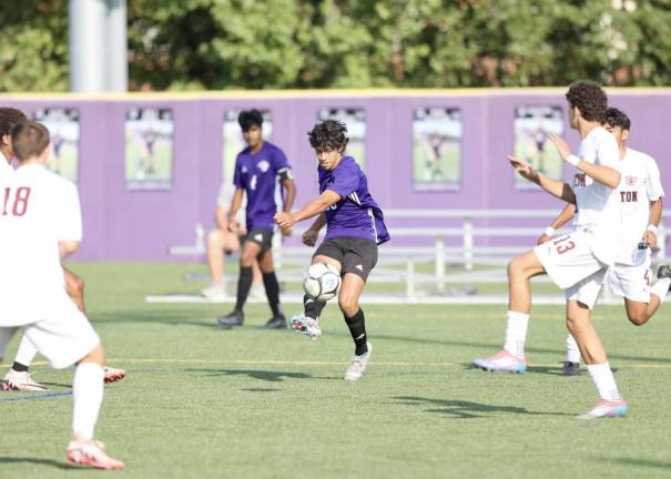 Nicholas Almeida, #23, fires a missile through the Tigers’ defense for a goal.