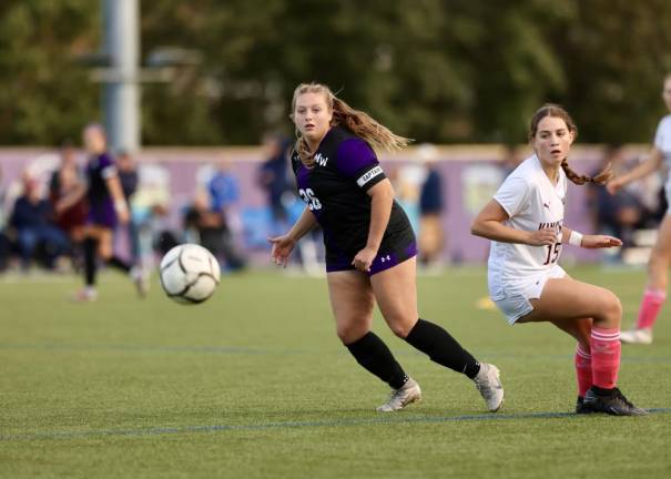 Samantha Key, #26, puts the ball deep into the Tigers’ zone in the second half.