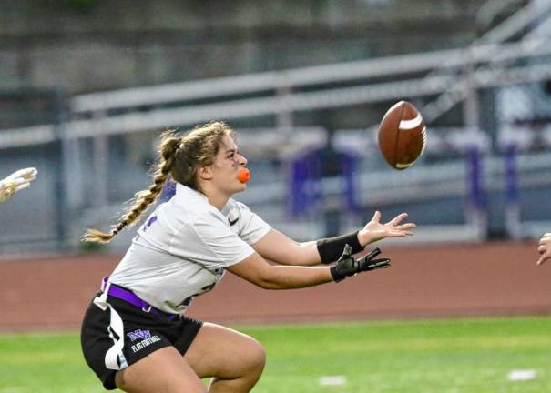 Efthalia Maikisch, #21, catches her second touchdown pass in the second half.