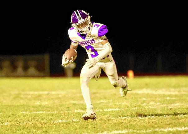 Louis Meade, #3, sprints 39 yards down the side line for the winning score late in the fourth quarter.