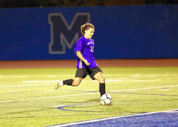 Lucas Ortiz, #20, ends the game with this penalty kick.