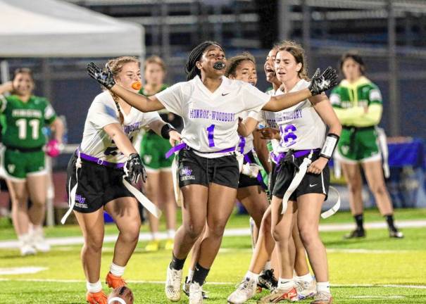 Kristina Gilota, #1, celebrates her second half diving interception.