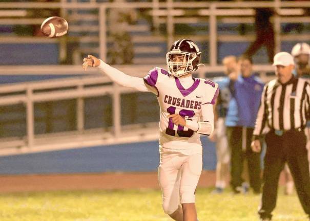 Quarterback Ethan Maldonado, #16, threw three touchdown passes in the game.