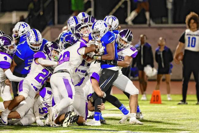 The Crusaders’ defense stopped the Middies in the second half.