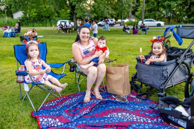 Mom Kallee and kids Amelia, Autumn, and baby Ashton of Monroe at the Monroe Fireworks 2024. Photo by Sammie Finch