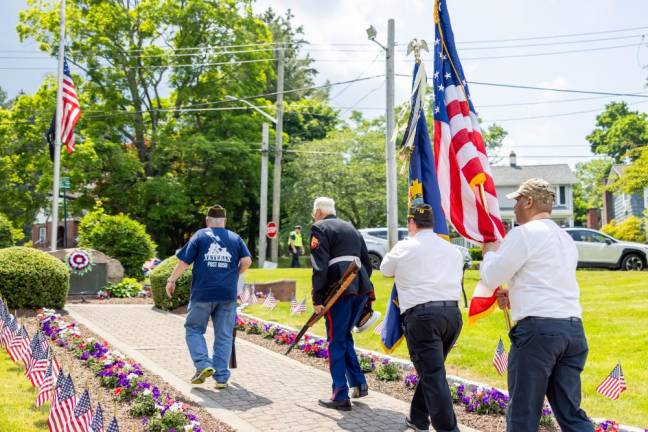 Local vets place memorial wreaths at Veterans Memorial Park during the annual Memorial Day parade in Monroe. Photo by Sammie Finch