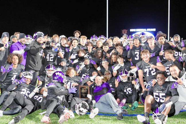 The Crusaders celebrate their Section 9 AA crown.