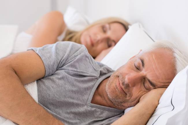 Specialists say there are benefits to couples sleeping separately