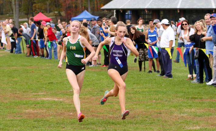 Crusader Jessica Pidgeon edges out Sarah Trainor of FDR for second place in the Class A race.